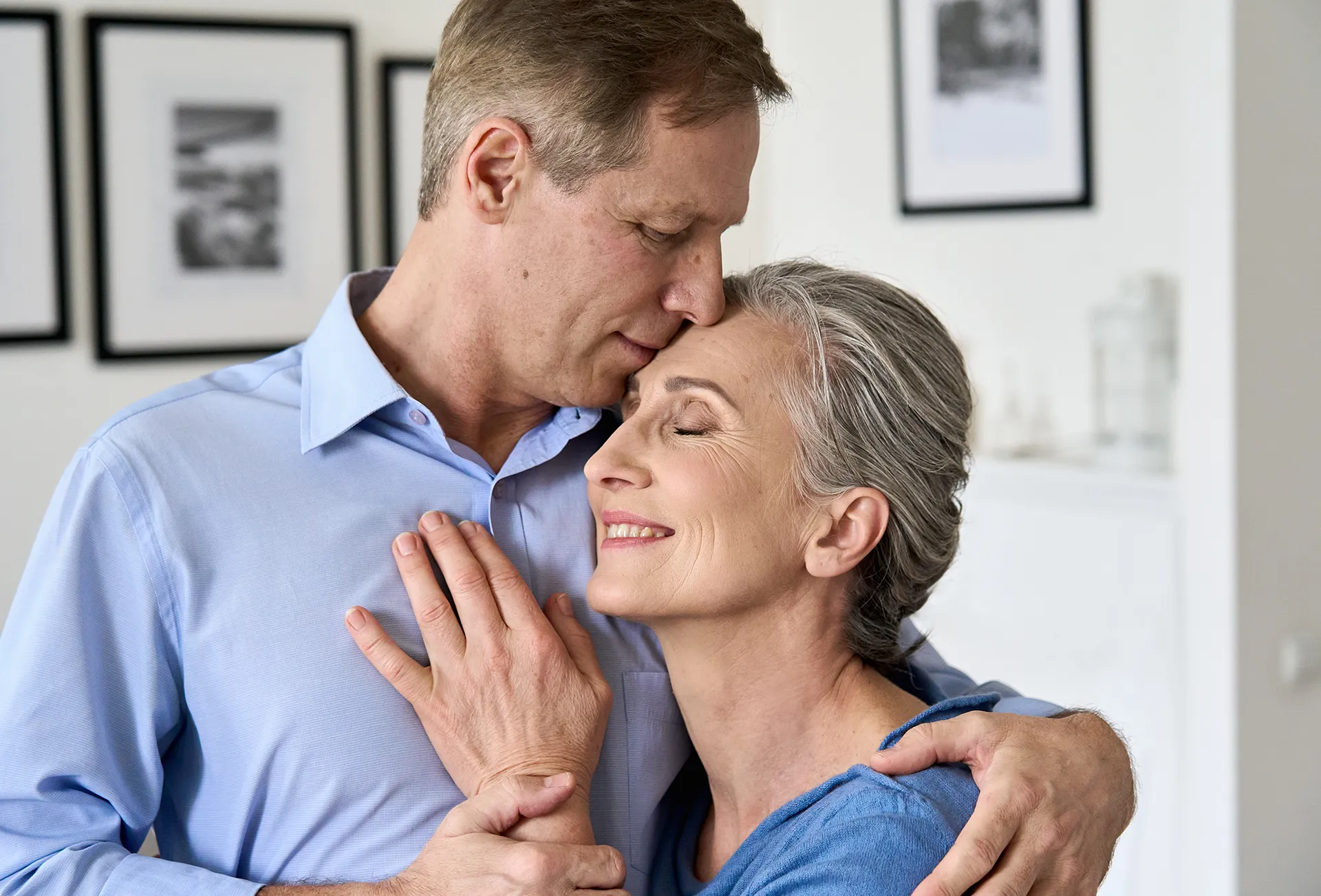 Retirement Planning - Couple Sharing Affectionate Time Together at Home