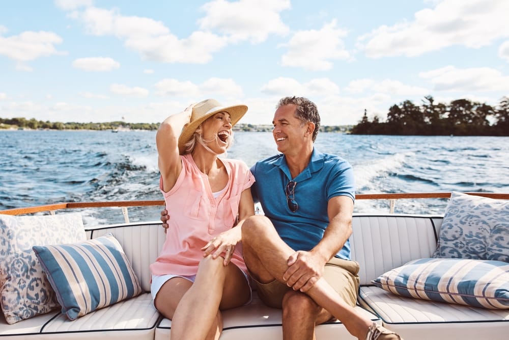 Retirement Planning - Couple Laughing and Enjoying Quality Time Together Outdoors